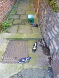 alleyway-with-abandoned-shoes